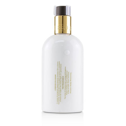 Molton Brown Mesmerising Oudh Accord & Gold Body Lotion 300ml/10oz